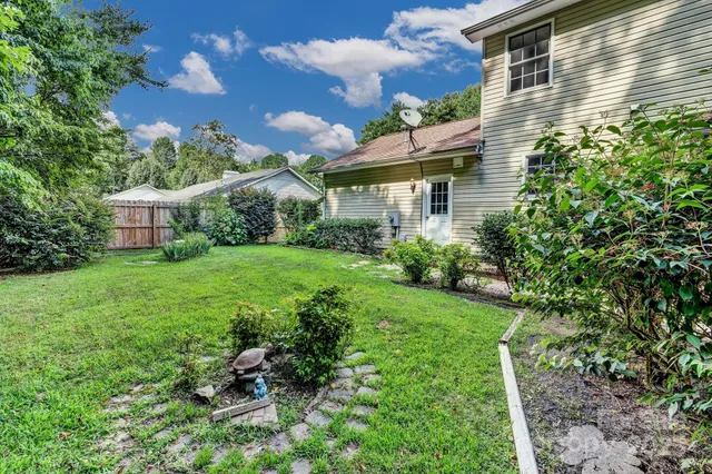 a view of a house with a garden