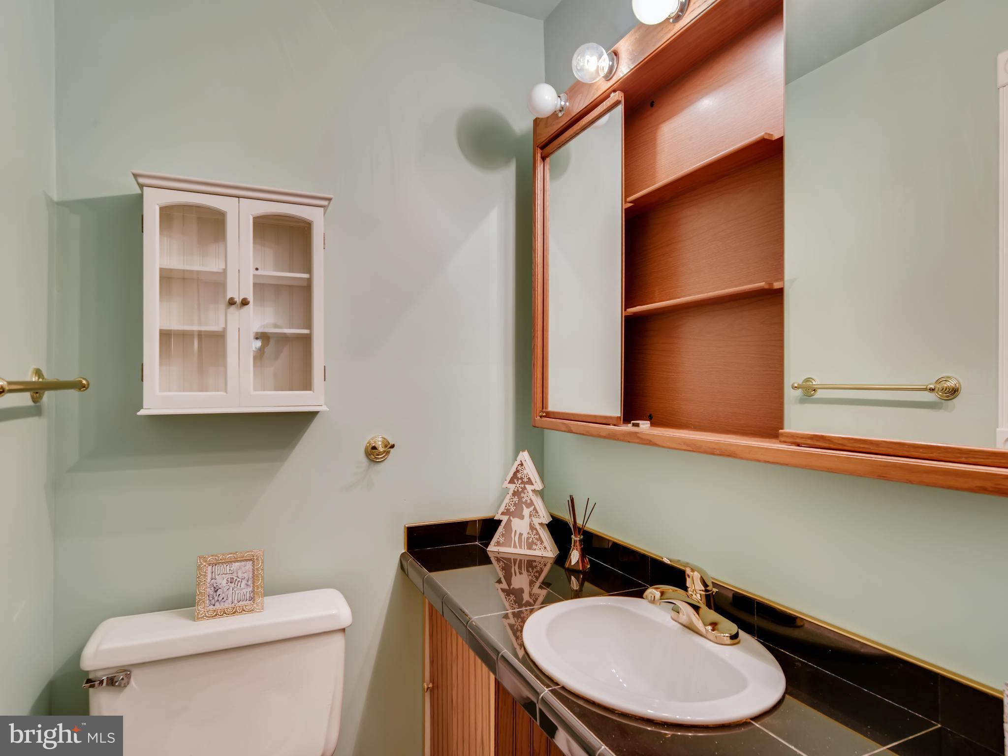 8614 Goldenwood Road Baltimore, MD 21237 - Photo 18 of 34 Master private half bath