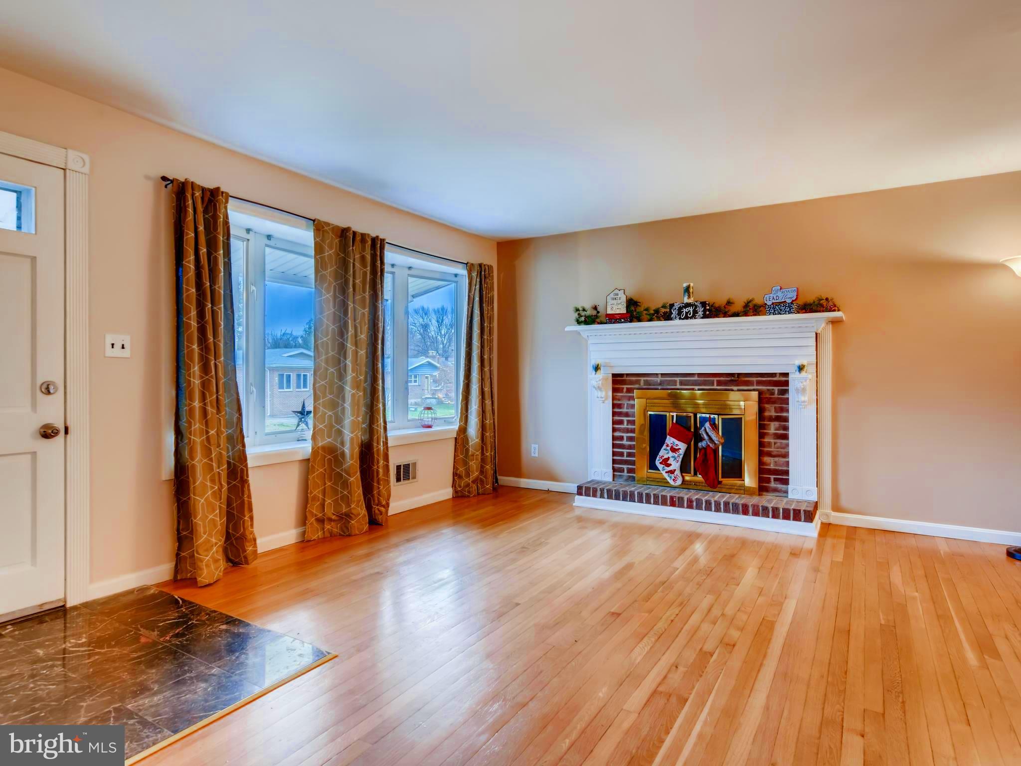 8614 Goldenwood Road Baltimore, MD 21237 - Photo 7 of 34 Glistening hardwood floors and large bay window