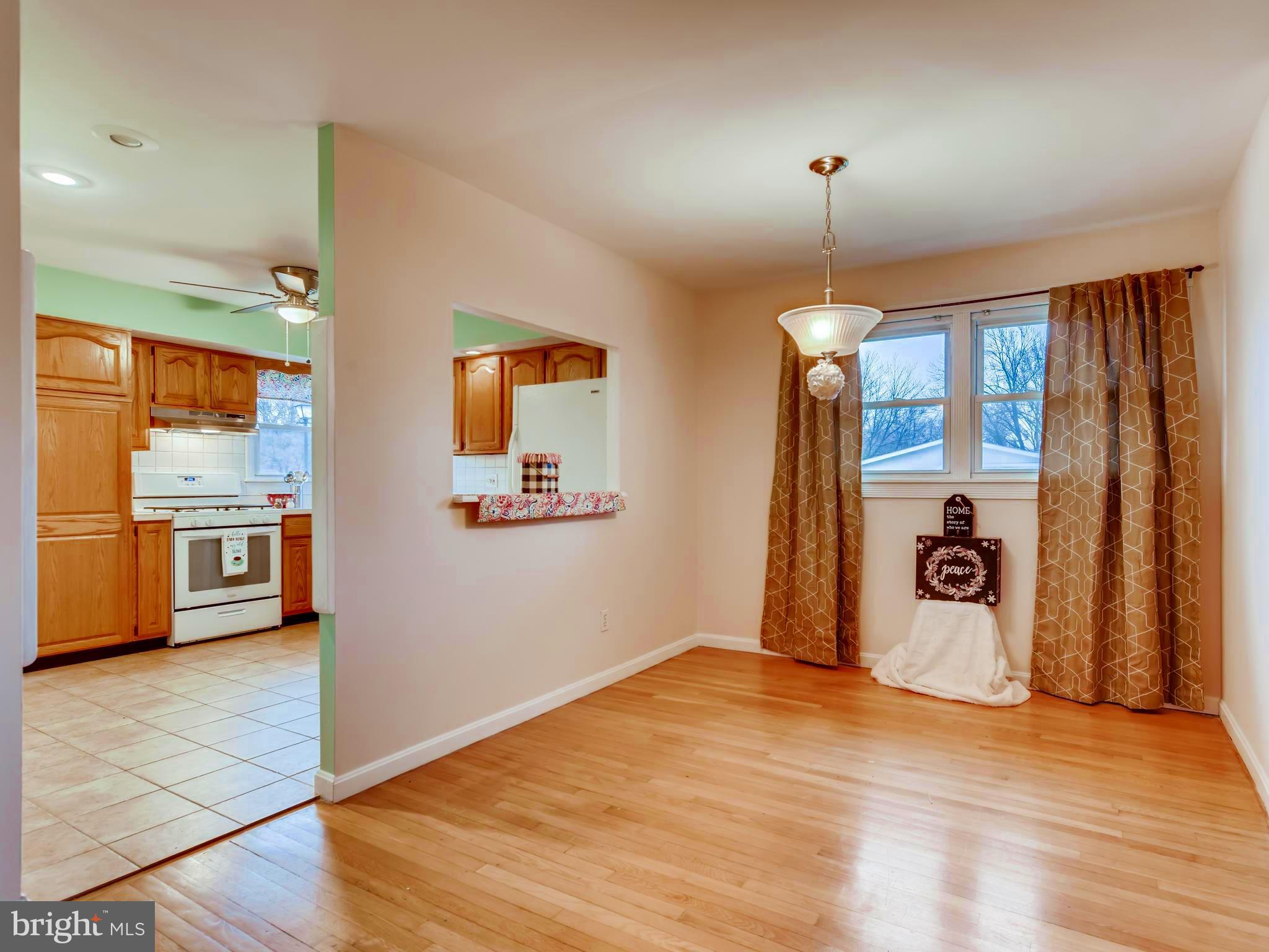 8614 Goldenwood Road Baltimore, MD 21237 - Photo 9 of 34 DR is open to LR and Kitchen
