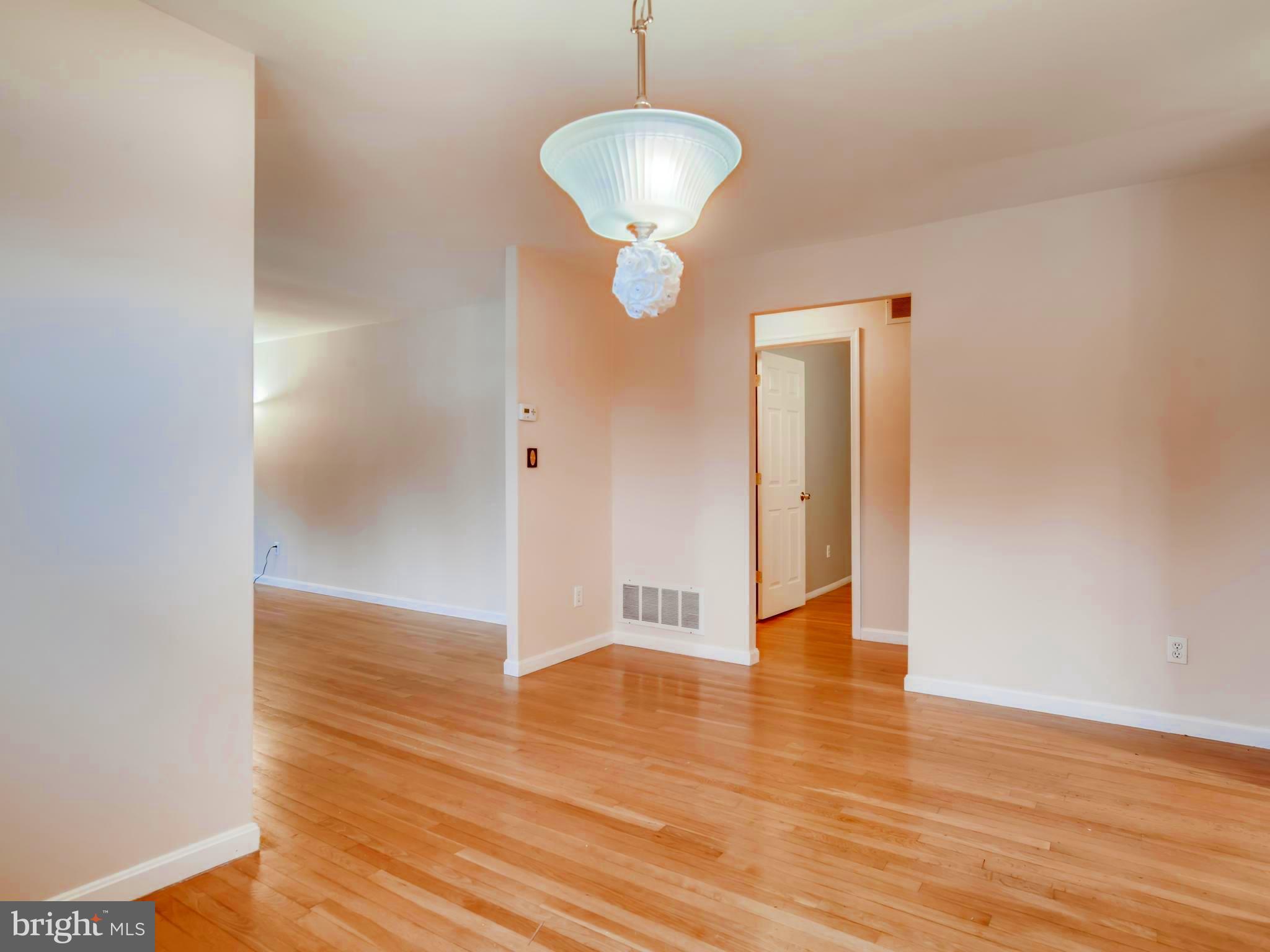 8614 Goldenwood Road Baltimore, MD 21237 - Photo 10 of 34 Central Dining Room leads to Bedroom wing