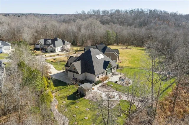 $1,100,000 | 7295 Henson Forest Drive, Summerfield, NC 27358