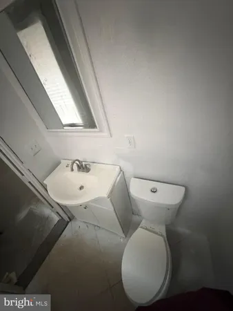 a view of bathroom with a toilet
