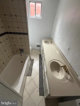 a bathroom with a sink and a toilet