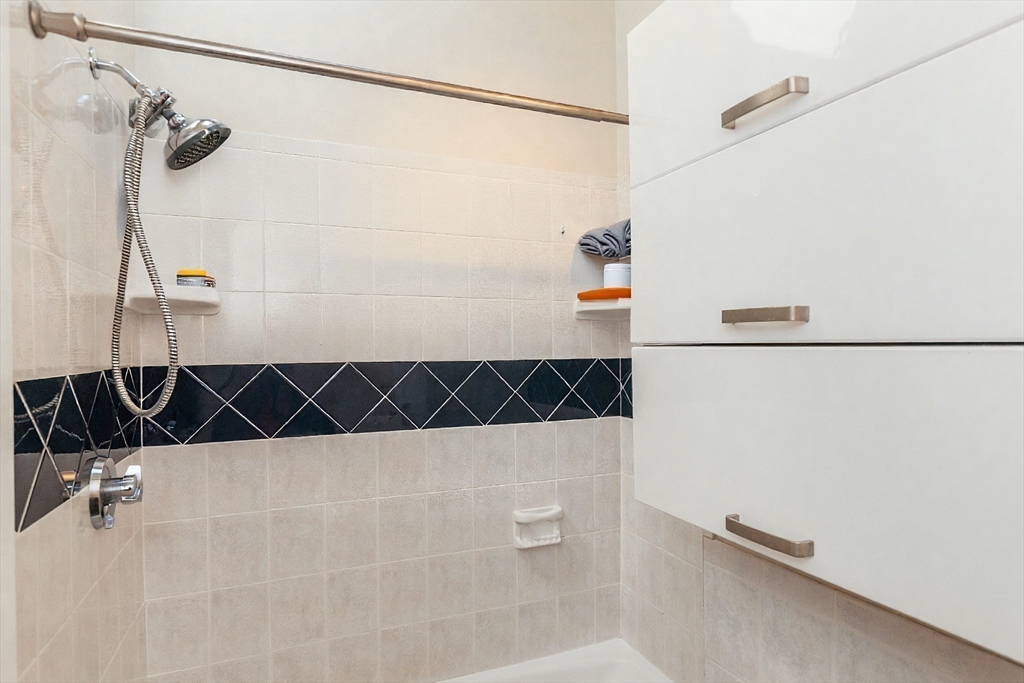 9 Fayette Street, Unit 4 Boston, MA 02116 - Photo 12 of 20 a bathroom with a shower