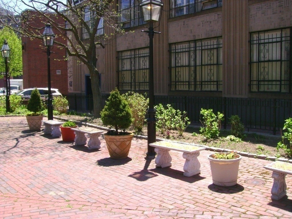 9 Fayette Street, Unit 4 Boston, MA 02116 - Photo 20 of 20 a view of a fire pit with potted plants