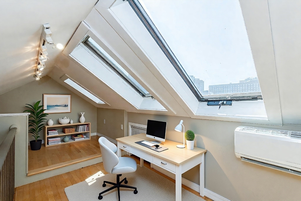 9 Fayette Street, Unit 4 Boston, MA 02116 - Photo 5 of 20 a workspace with furniture and window