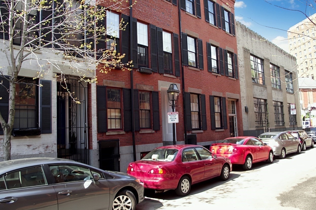 9 Fayette Street, Unit 4 Boston, MA 02116 - Photo 7 of 20 a front view of a building with parking space