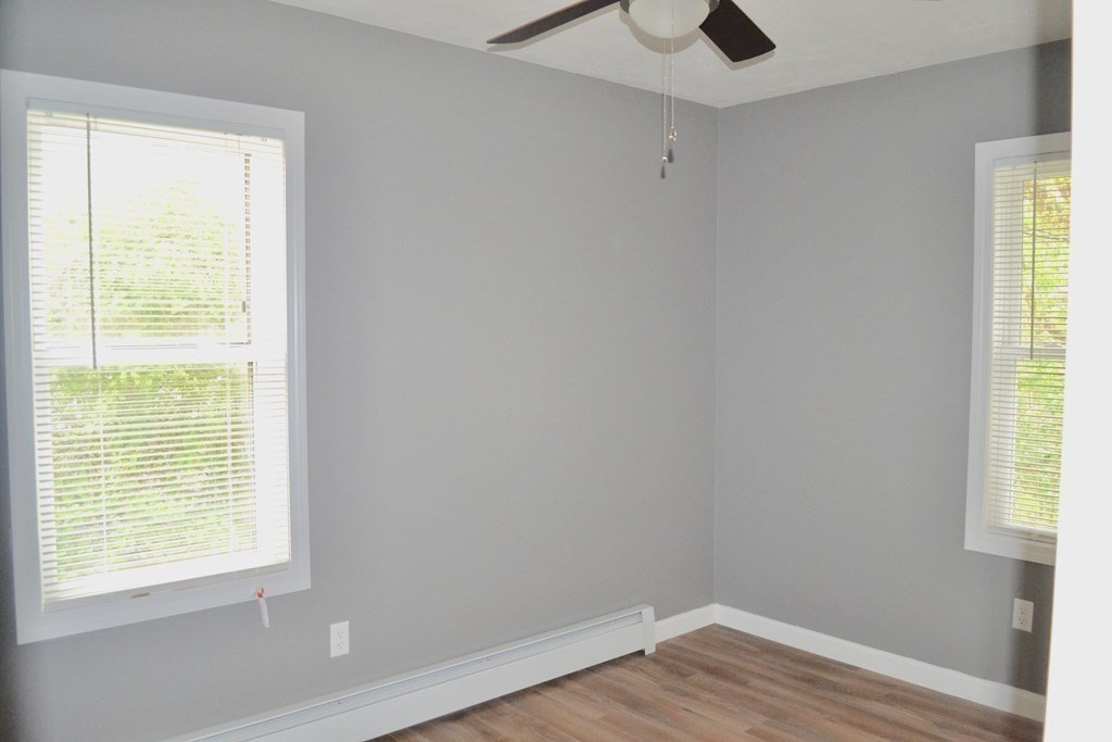 7 Havana Road Worcester, MA 01603 - Photo 8 of 10 a view of an empty room with wooden floor and a window