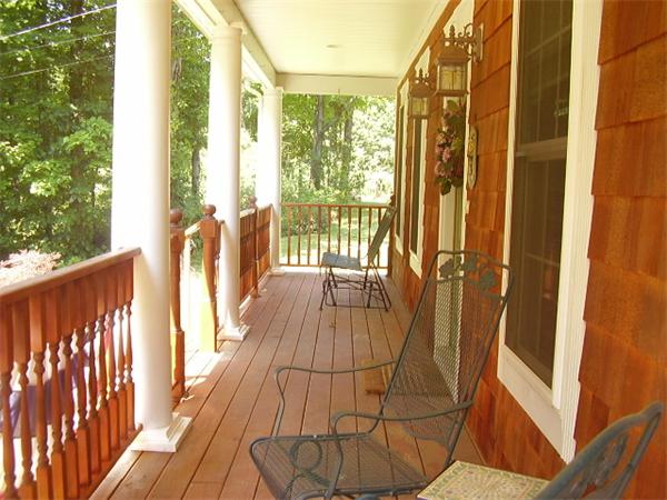 216 Brookfield Road Sturbridge, MA 01518 - Photo 14 of 18 a view of balcony with wooden floor
