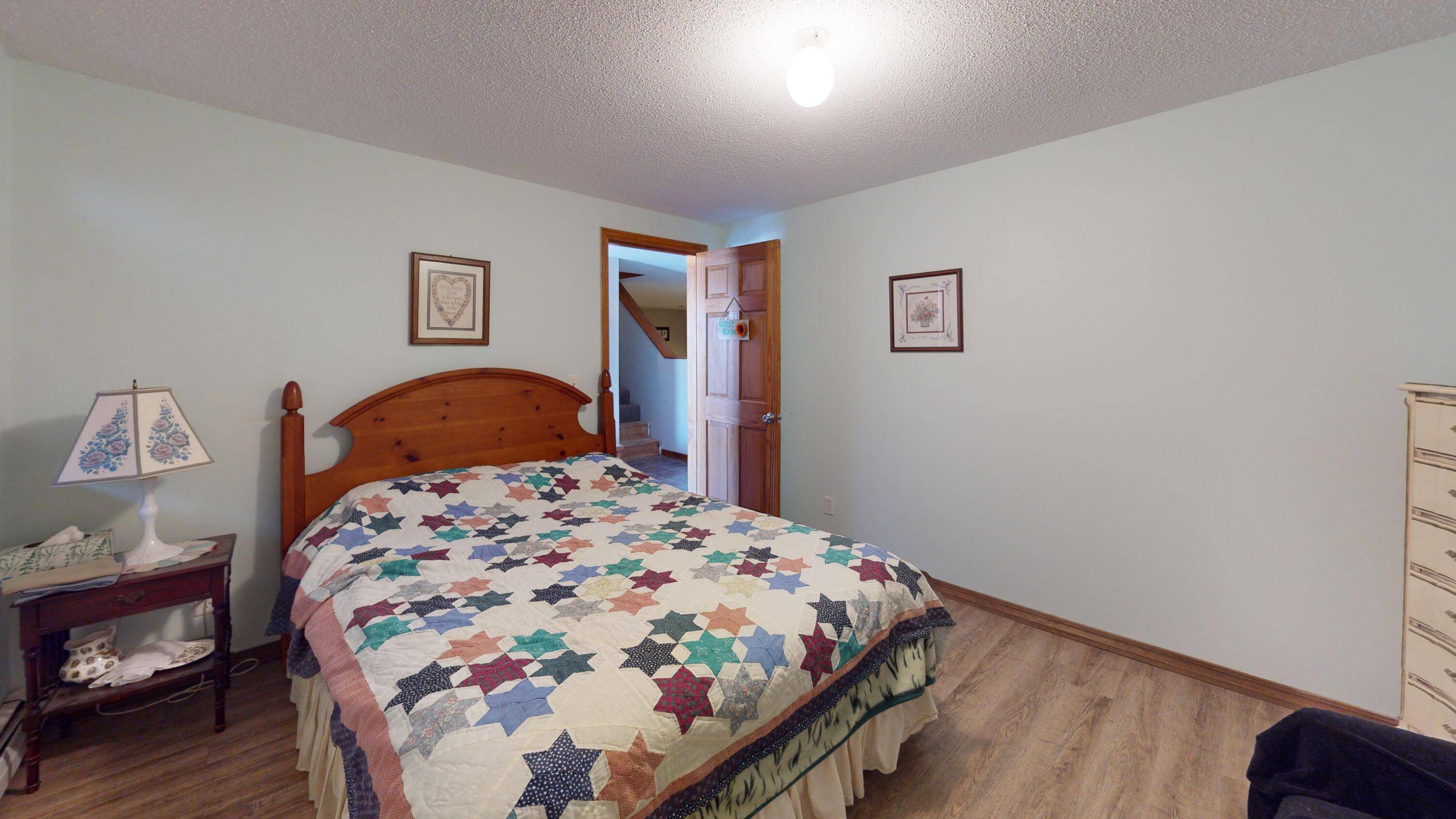 303 Phinney Farm Road Lincoln, ME 04457 - Photo 25 of 37 303-Phinney-Farm-Rd-Bedroom