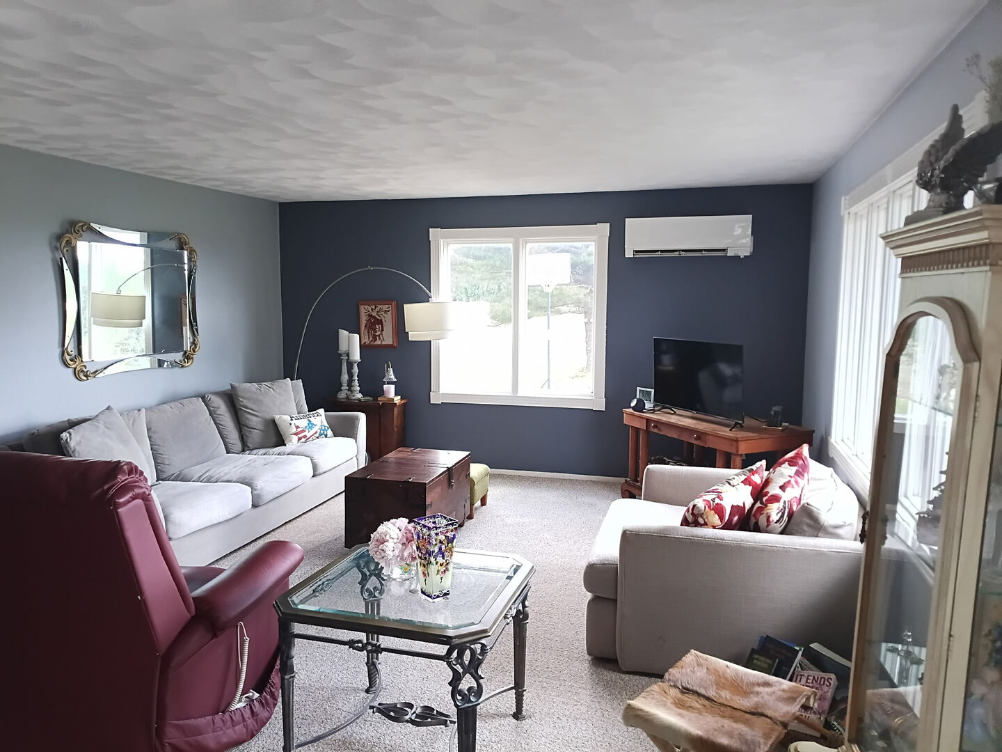 27986 Esmond Road Esmond, IL 60129 - Photo 10 of 39 a living room with furniture fireplace and a flat screen tv