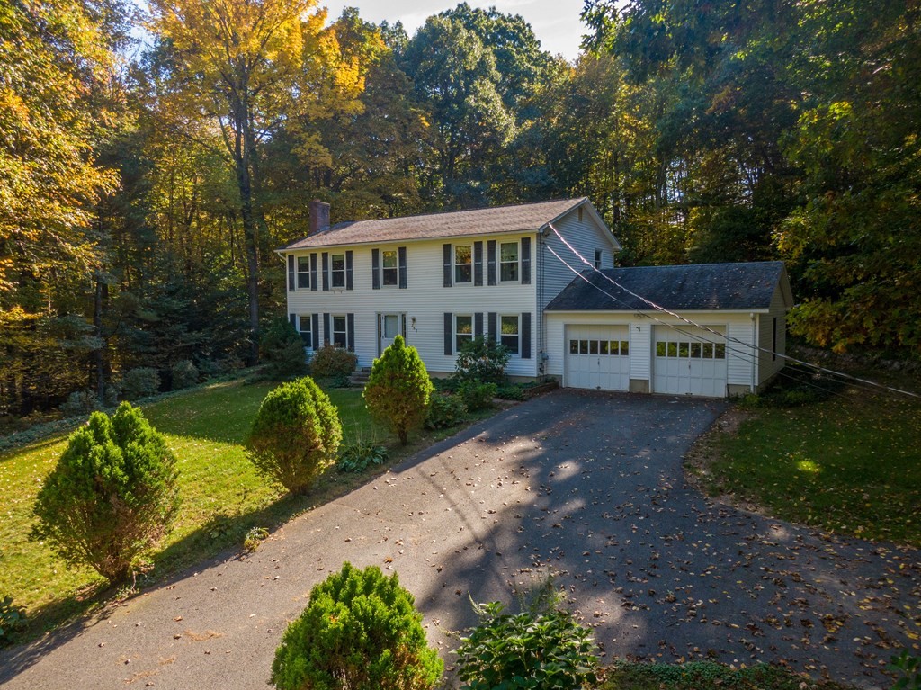 367 Bay Road Amherst, MA 01002 - Photo 1 of 27 a view of a house with a yard and potted plants