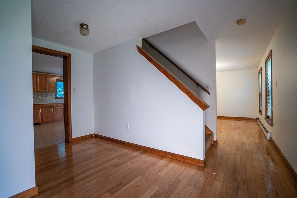 367 Bay Road Amherst, MA 01002 - Photo 11 of 27 wooden floor in an empty room with a window