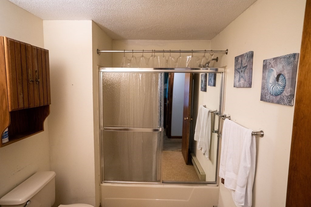 367 Bay Road Amherst, MA 01002 - Photo 14 of 27 a bathroom with a shower and a sink