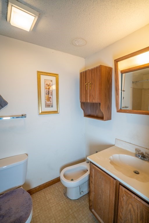 367 Bay Road Amherst, MA 01002 - Photo 23 of 27 a bathroom with a sink and a mirror