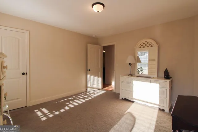 a view of a livingroom with a furniture