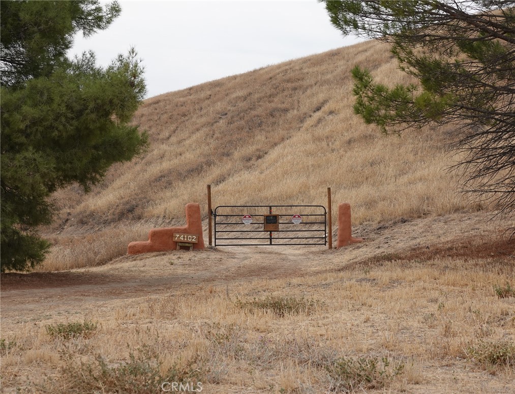 a view of a big yard with an outdoor space