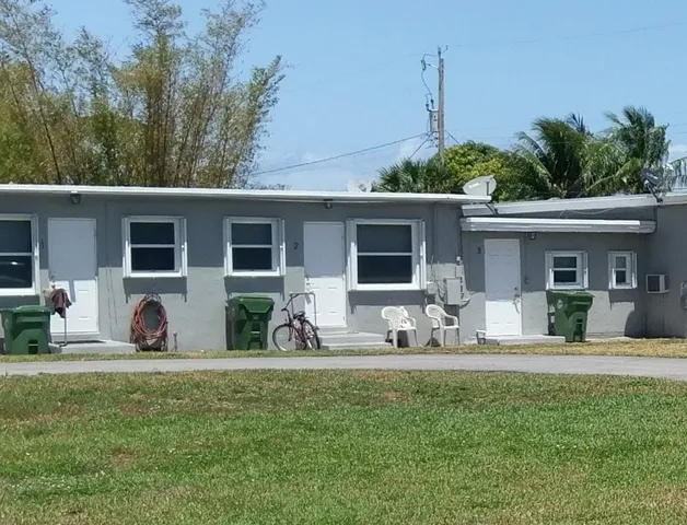 a front view of a house with patio