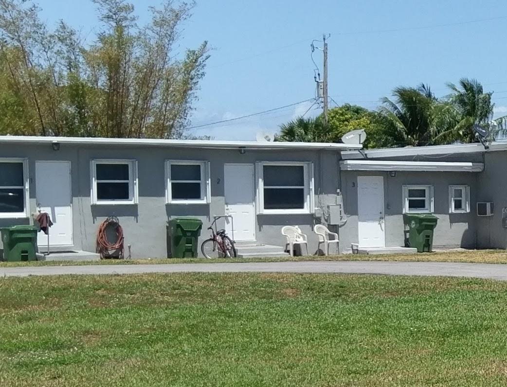 a front view of a house with patio