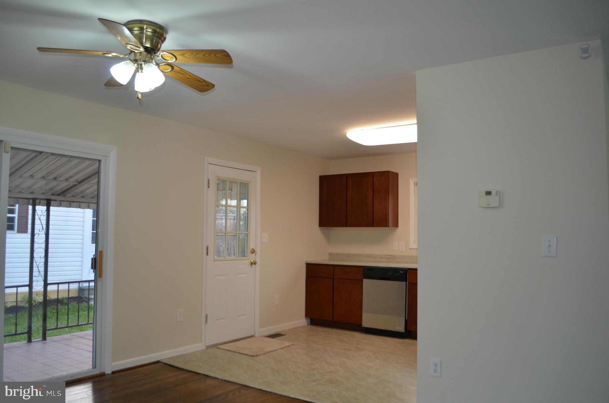6101 Collinsway Road Catonsville, MD 21228 - Photo 5 of 17 Kitchen and Dining Open to Yard