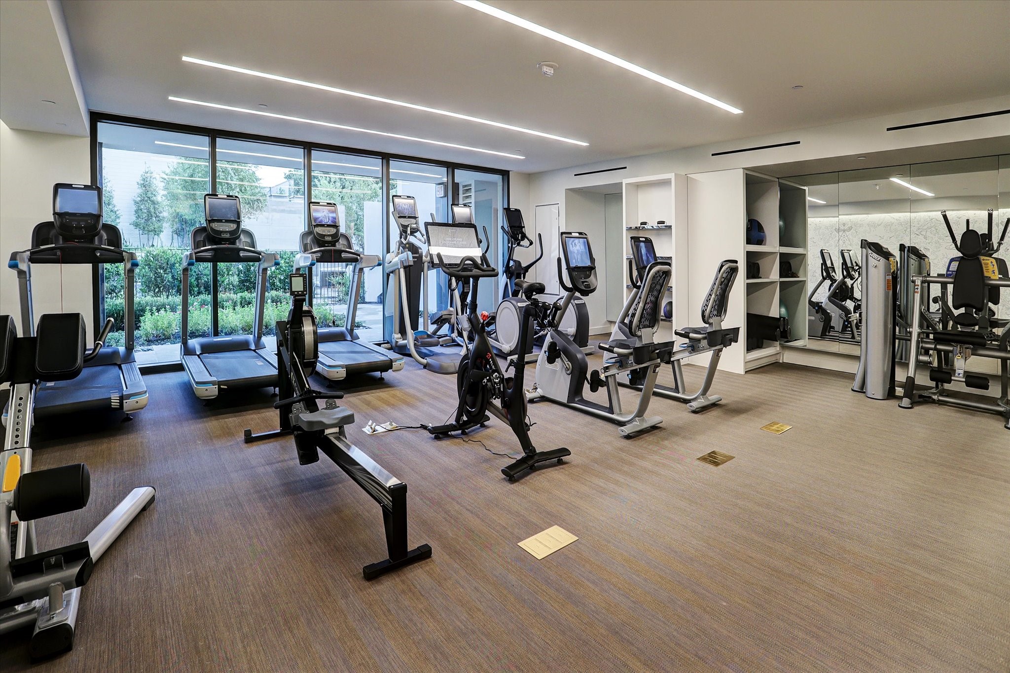 3433 Westheimer Road, Unit 702 Houston, TX 77027 - Photo 44 of 48 Maintain your wellness routine with a fully equipped fitness center just steps from your residence.