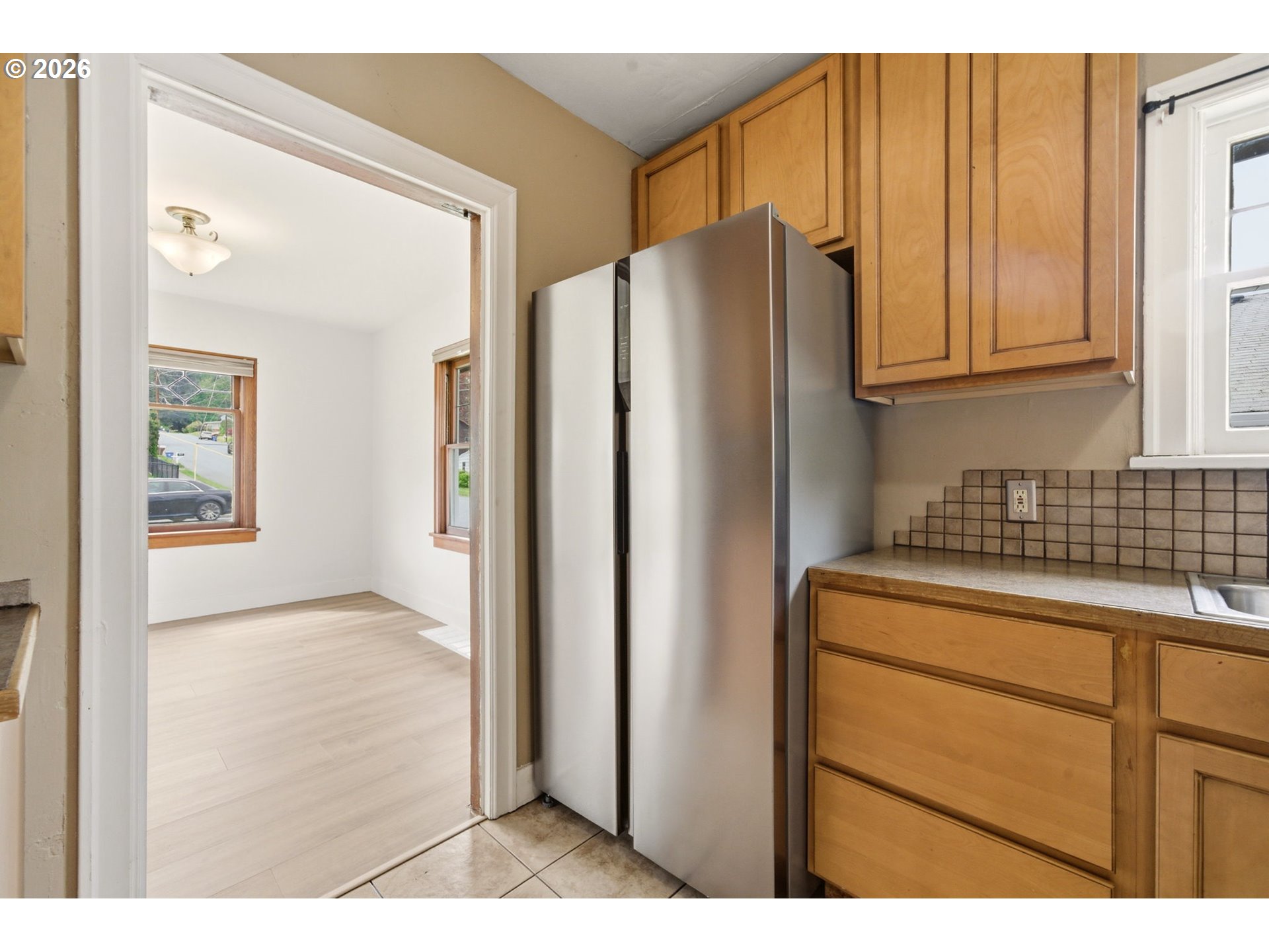 1804 Division Street Camas, WA 98607 - Photo 15 of 43 a kitchen with stainless steel appliances granite countertop a refrigerator and a sink
