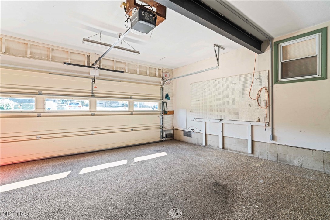 4270 Mellinger Road Canfield, OH 44406 - Photo 49 of 49 Garage featuring a garage door opener