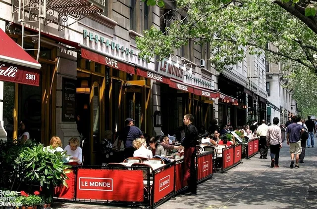 a view of a building with a backyard