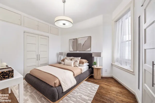 a kitchen with sink a stove and cabinets