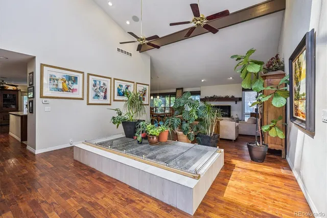 a living room with furniture and a rug