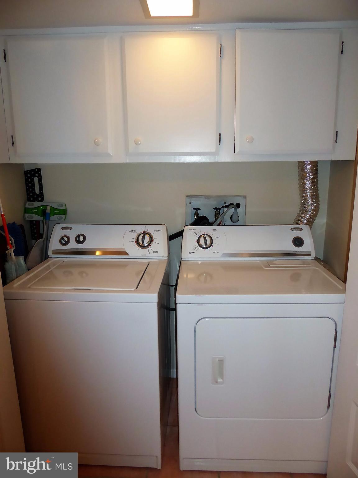 1731 Ivy Oak Square, Unit 9 Reston, VA 20190 - Photo 14 of 30 Washer & Dryer Closet in Family Room