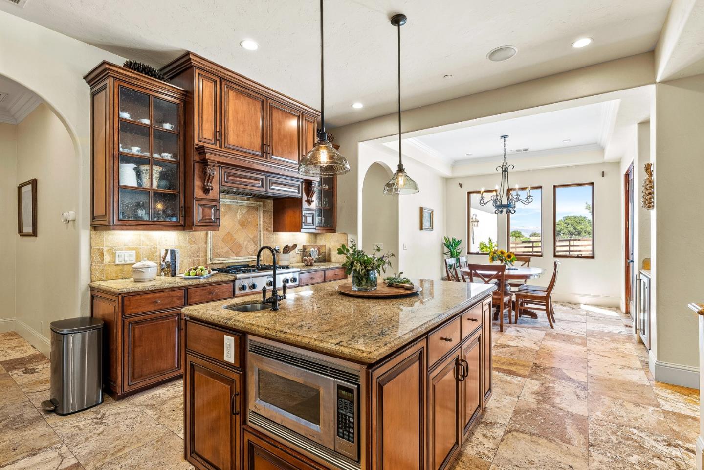 432 River Road Salinas, CA 93908 - Photo 20 of 64 a kitchen with stainless steel appliances granite countertop a stove a sink and a wooden floors