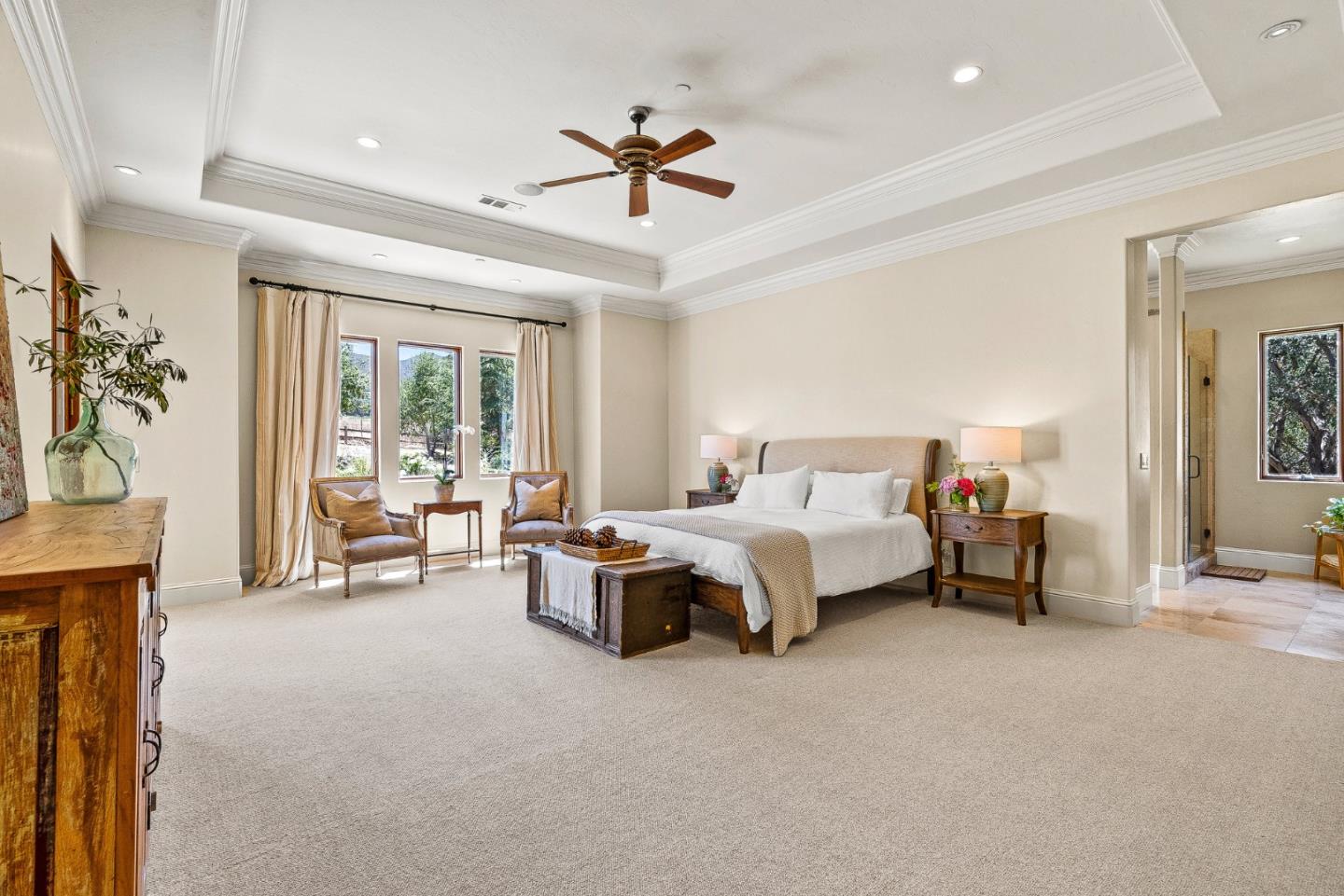 432 River Road Salinas, CA 93908 - Photo 28 of 64 a spacious bedroom with a bed and a chandelier