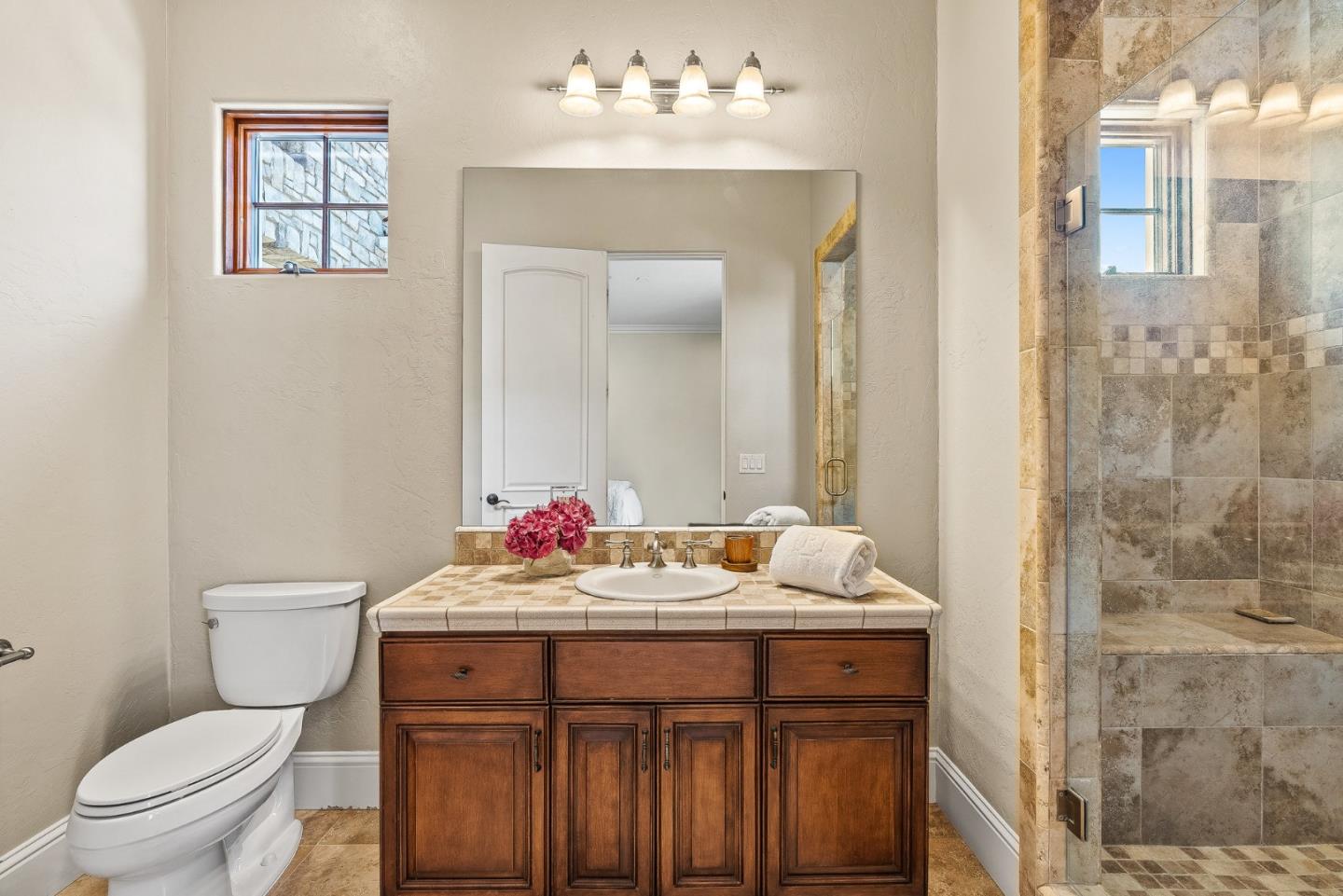 432 River Road Salinas, CA 93908 - Photo 38 of 64 a bathroom with a sink vanity mirror and toilet