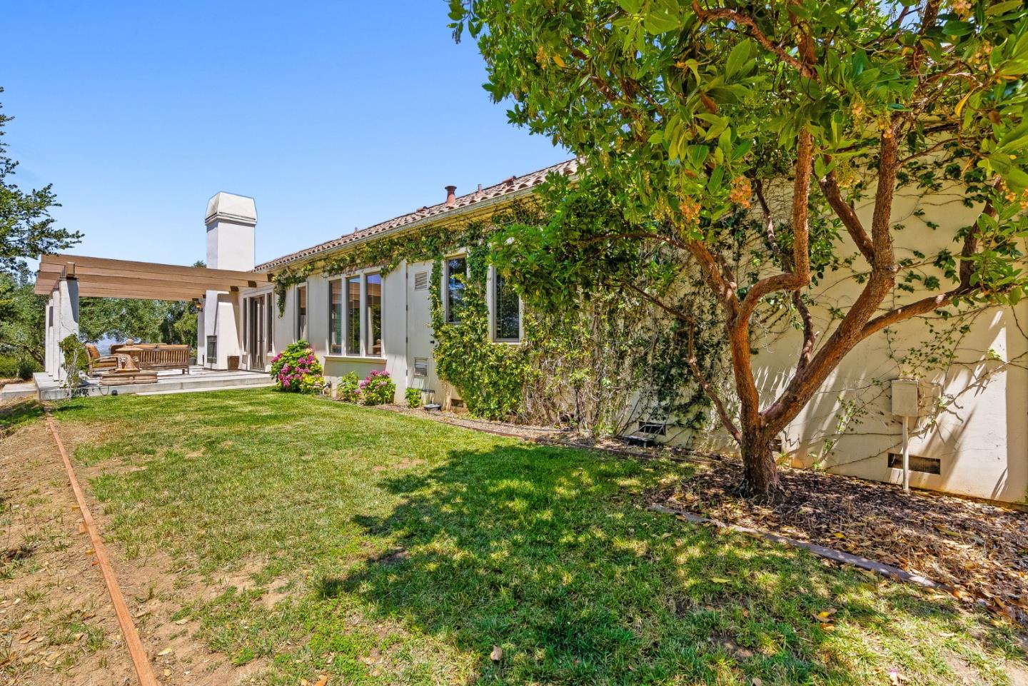 432 River Road Salinas, CA 93908 - Photo 48 of 64 a view of a patio with table and chairs and potted plants