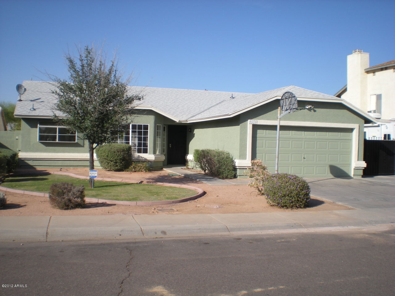 8656 West Monte Vista Road Phoenix, AZ 85037 - Photo 1 of 6 Front of Home