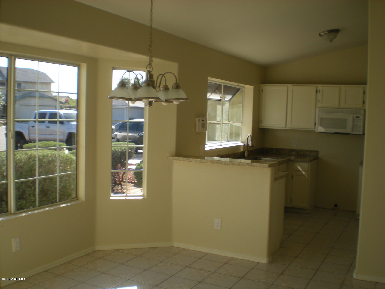 8656 West Monte Vista Road Phoenix, AZ 85037 - Photo 3 of 6 Dining Room/Kitchen