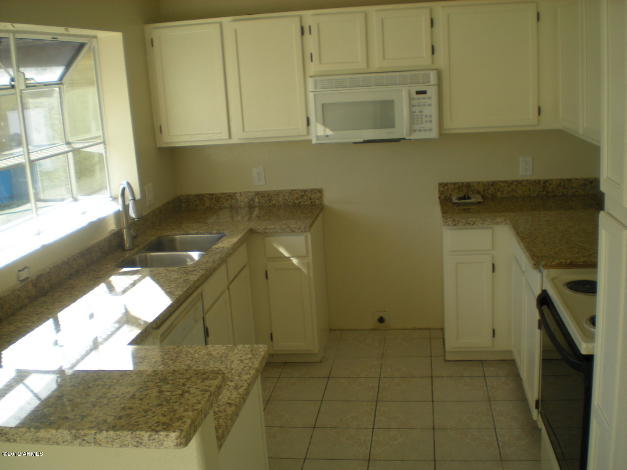 8656 West Monte Vista Road Phoenix, AZ 85037 - Photo 4 of 6 Kitchen almost Done
