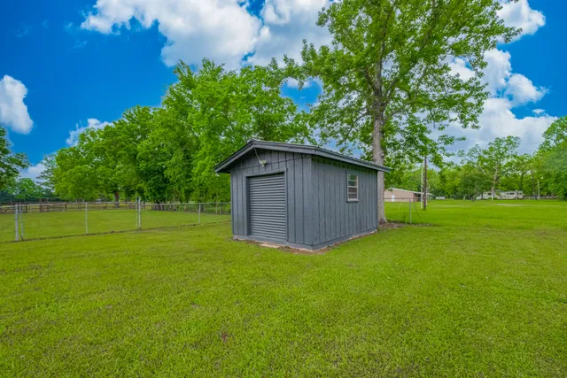 a view of a backyard with a garden
