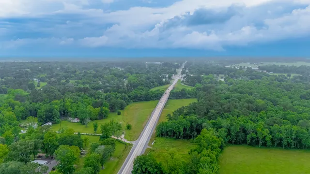 a view of lake with green space