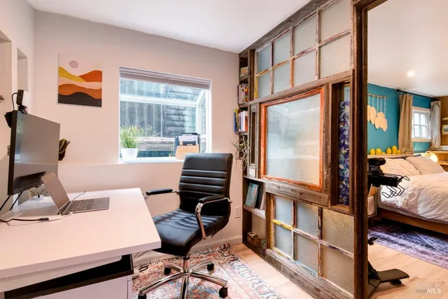 a room with furniture and a window