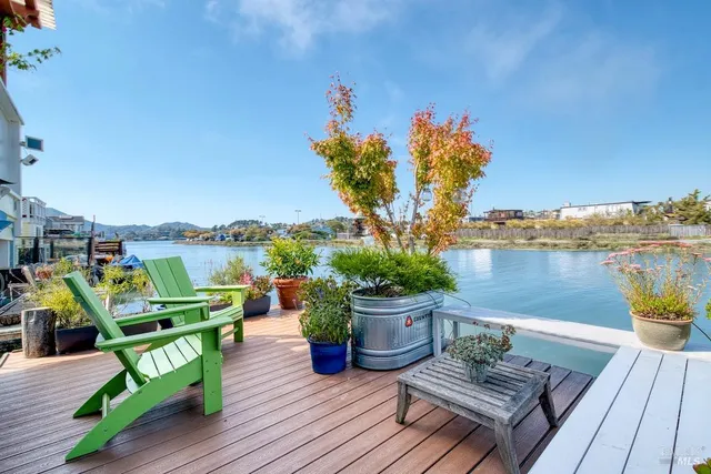 a view of a chairs on the roof deck