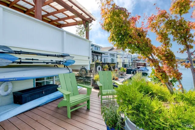 a view of a balcony with chairs