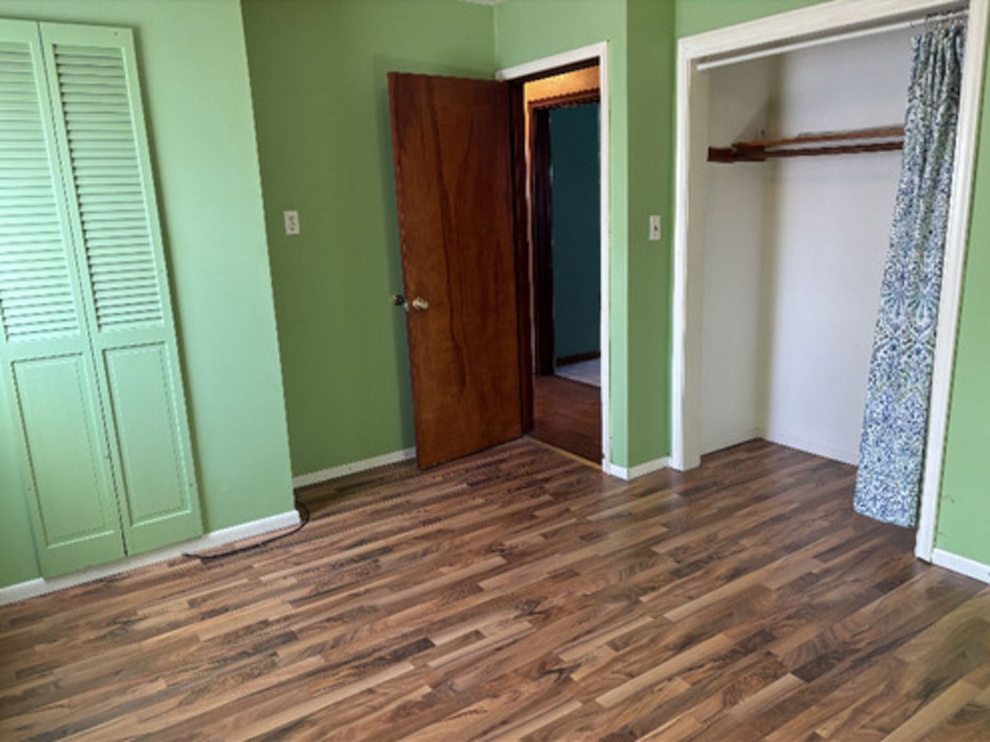 201 South Carson Street Long Point, IL 61333 - Photo 13 of 20 a view of a room with wooden floor and stairs