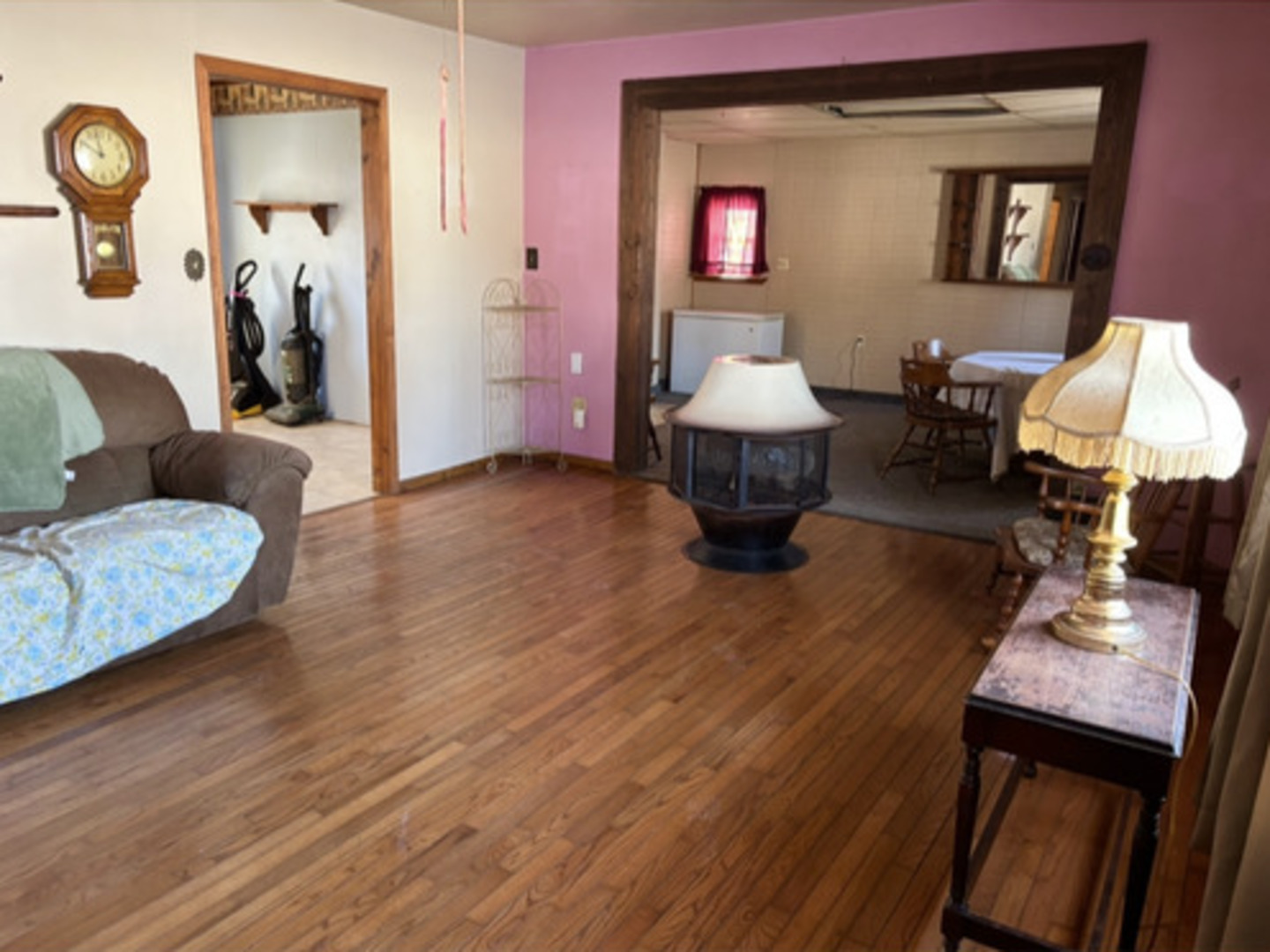 201 South Carson Street Long Point, IL 61333 - Photo 7 of 20 a living room with furniture a window and a wooden floor