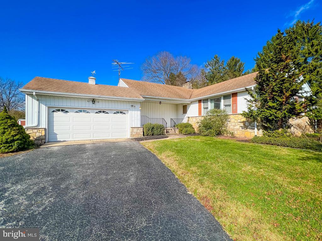883 Parkwood Road Blue Bell, PA 19422 - Photo 2 of 65 Make your way up to the front door & covered porch