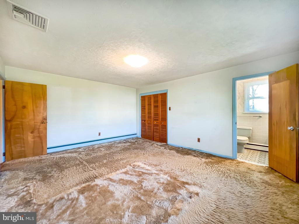 883 Parkwood Road Blue Bell, PA 19422 - Photo 25 of 65 Primary Bedroom with hardwood floors beneath