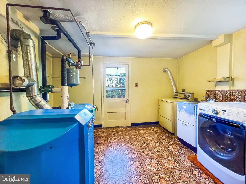883 Parkwood Road Blue Bell, PA 19422 - Photo 36 of 65 Utility room w/new hot water heater & laundry area