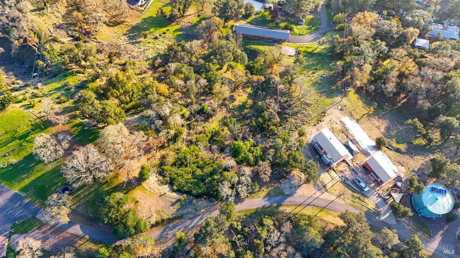 13370 Saddle Road Glen Ellen, CA 95442 - Photo 12 of 14 a view of a multi story yard with plants